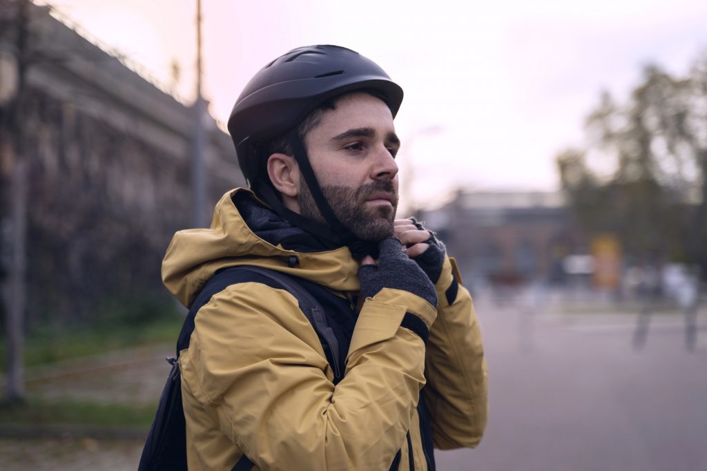 Portrait of a man wearing a helmet to ride a bike.
